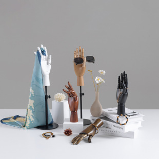 O1CN01oMTsSd1nondx6vdoA_2218826365137-0-cib.310x310.jpg Solid Wood Simulation Hand Mannequin - Jewelry Stand (With Movable Joints)